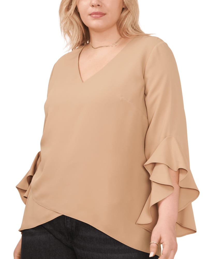 Front of a model wearing a size 1X Natalie Flutter Sleeve Tunic in FALL CAMEL by Vince Camuto. | dia_product_style_image_id:261948